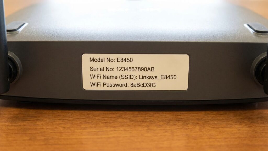 Linksys router bottom label showing default WiFi name SSID and WiFi password