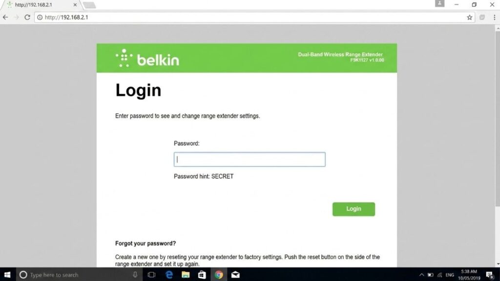 A desktop web browser displaying the Belkin router login page at the IP address 192.168.2.1, featuring a password entry field and instructions for resetting the wireless range extender.