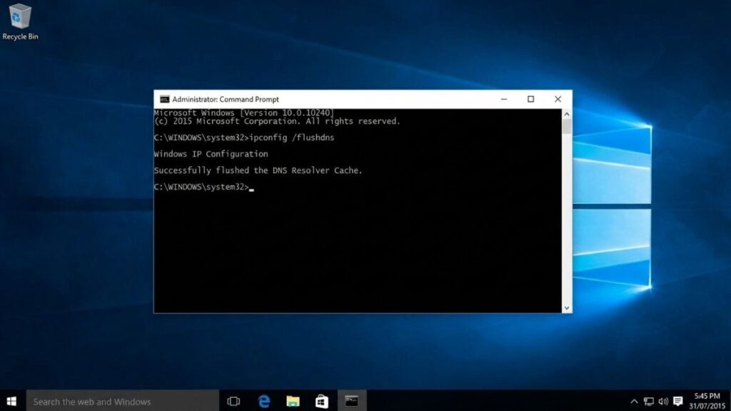 A Windows desktop background showing an open Administrator Command Prompt window where the ipconfig /flushdns command has successfully flushed the DNS resolver cache.