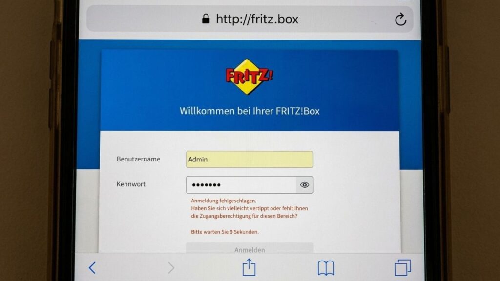 A smartphone screen displaying a failed FRITZ!Box router login attempt in a mobile browser at [http://fritz.box](http://fritz.box), showing a red German error message and a 9-second login timeout countdown.